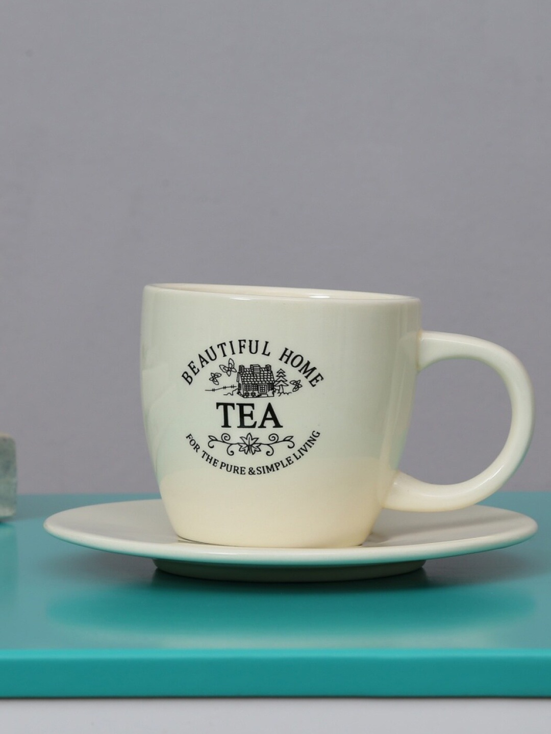 

Home Centre Beige & Black Text or Slogans Printed Ceramic Matte Cups and Saucers Set of Cups and Mugs