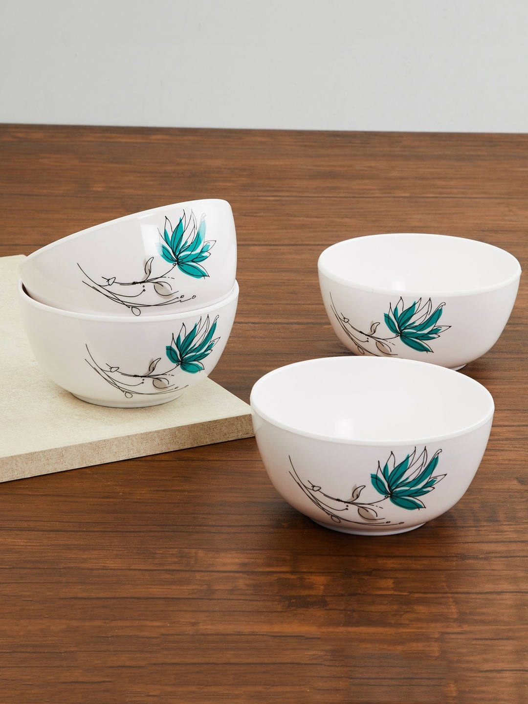 

Home Centre Set Of 4 Blue & White Printed Cereal Bowls