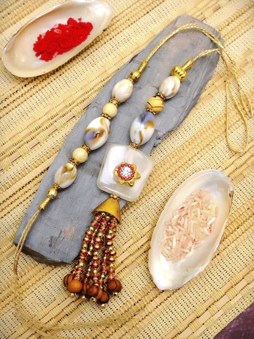 

Crunchy Fashion Designer Bhaiya Bhabhi Stone & Kundan Rakhi Set, Gold