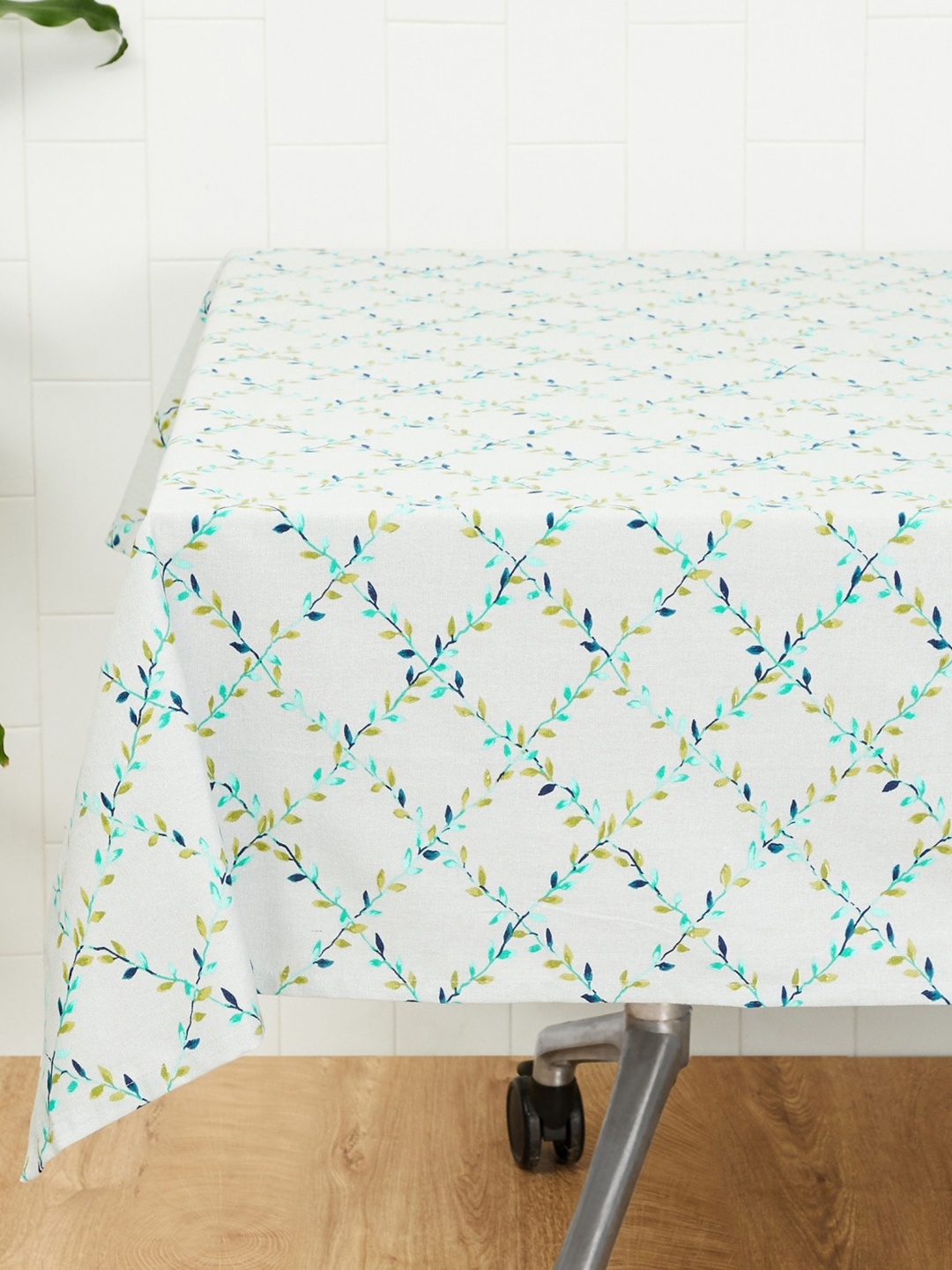 

Home Centre White & Green 4-Seater Kale Printed Table Cloth