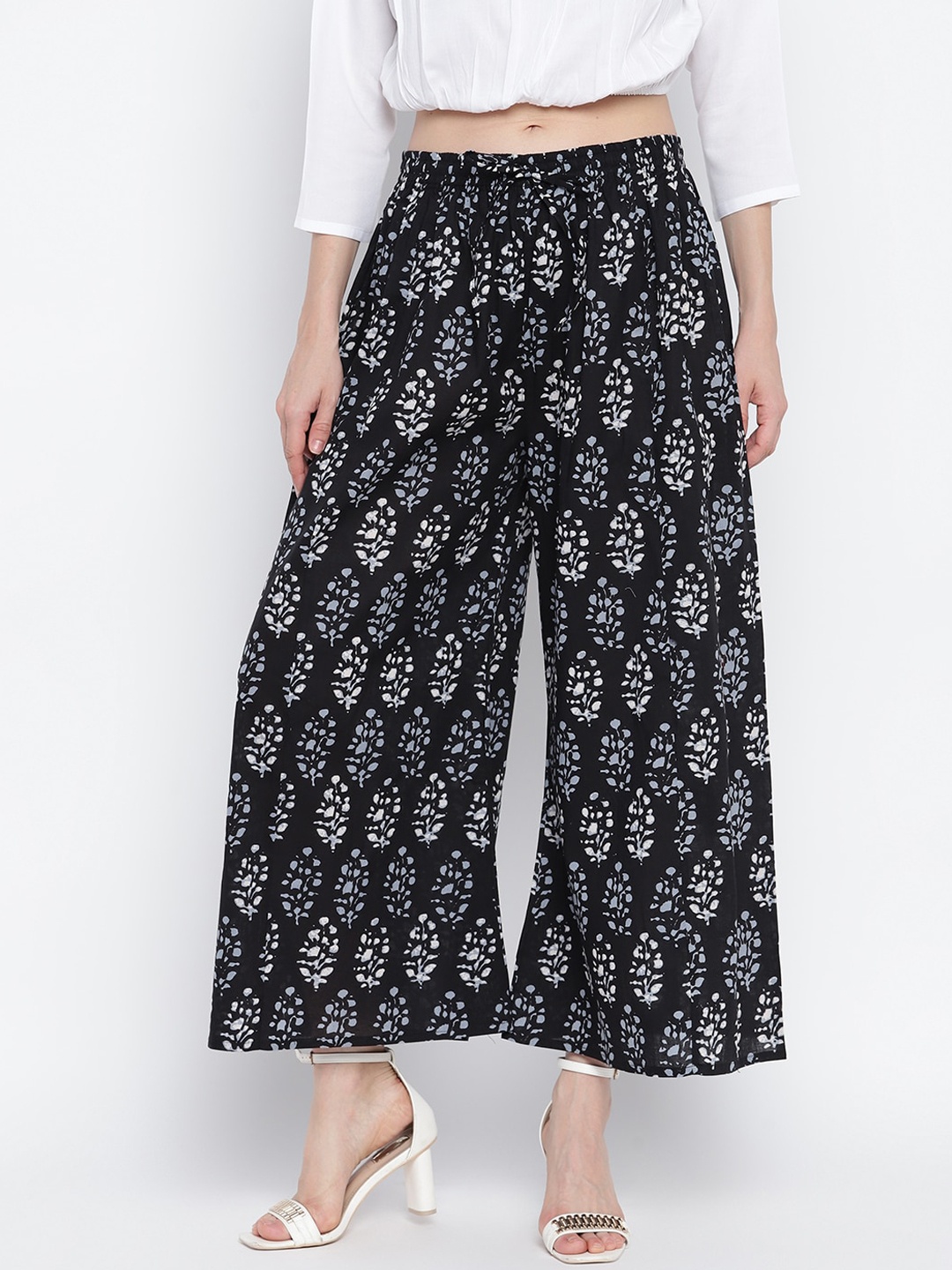 

Aawari Women Navy Blue Ethnic Motifs Printed High-Rise Parallel Trousers