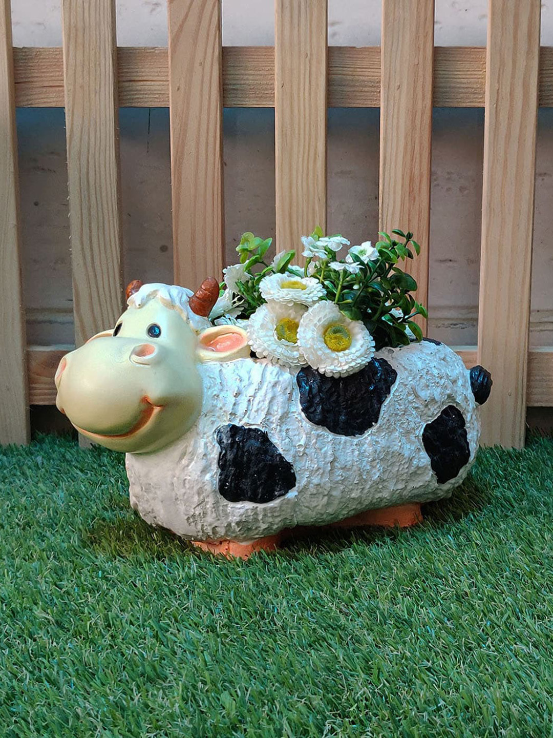 

Wonderland White & Black Cow Planter