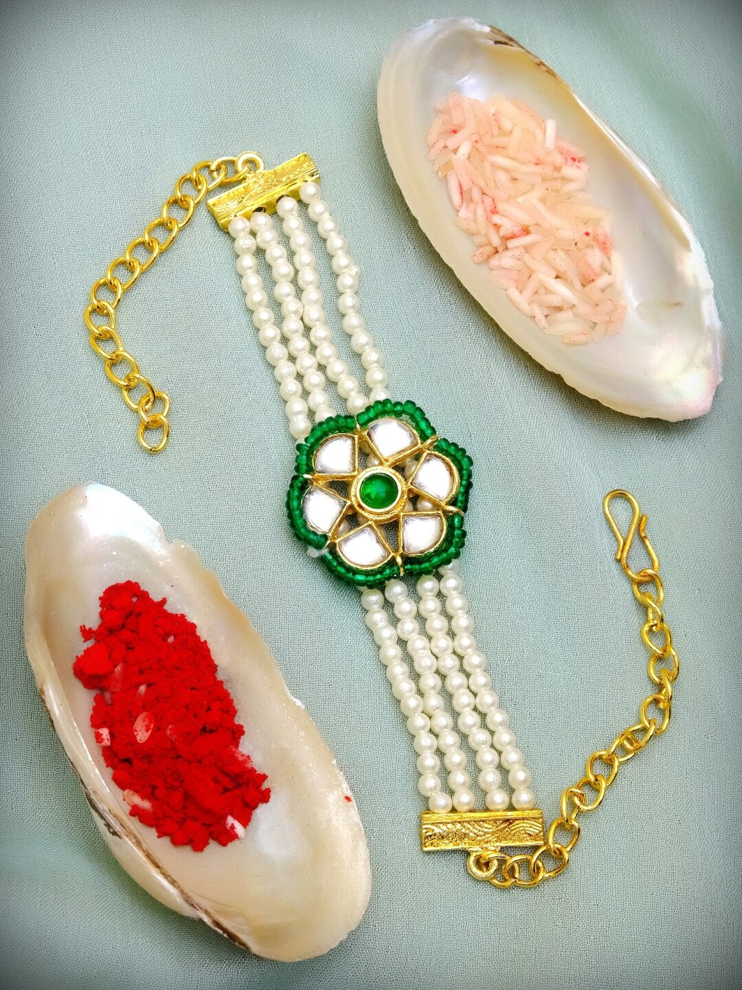 

Crunchy Fashion Bracelet Material Moti Kundan Rakhi With Roli & Chawal, White