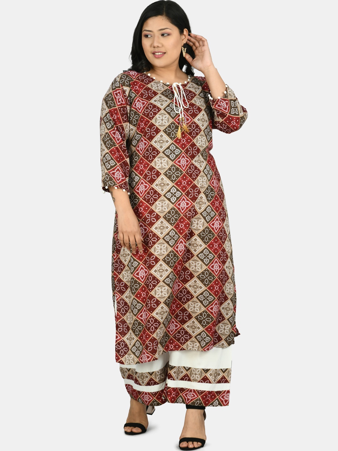 

PrettyPlus by Desinoor.com Women Red Bandhani Printed Kurti with Palazzos