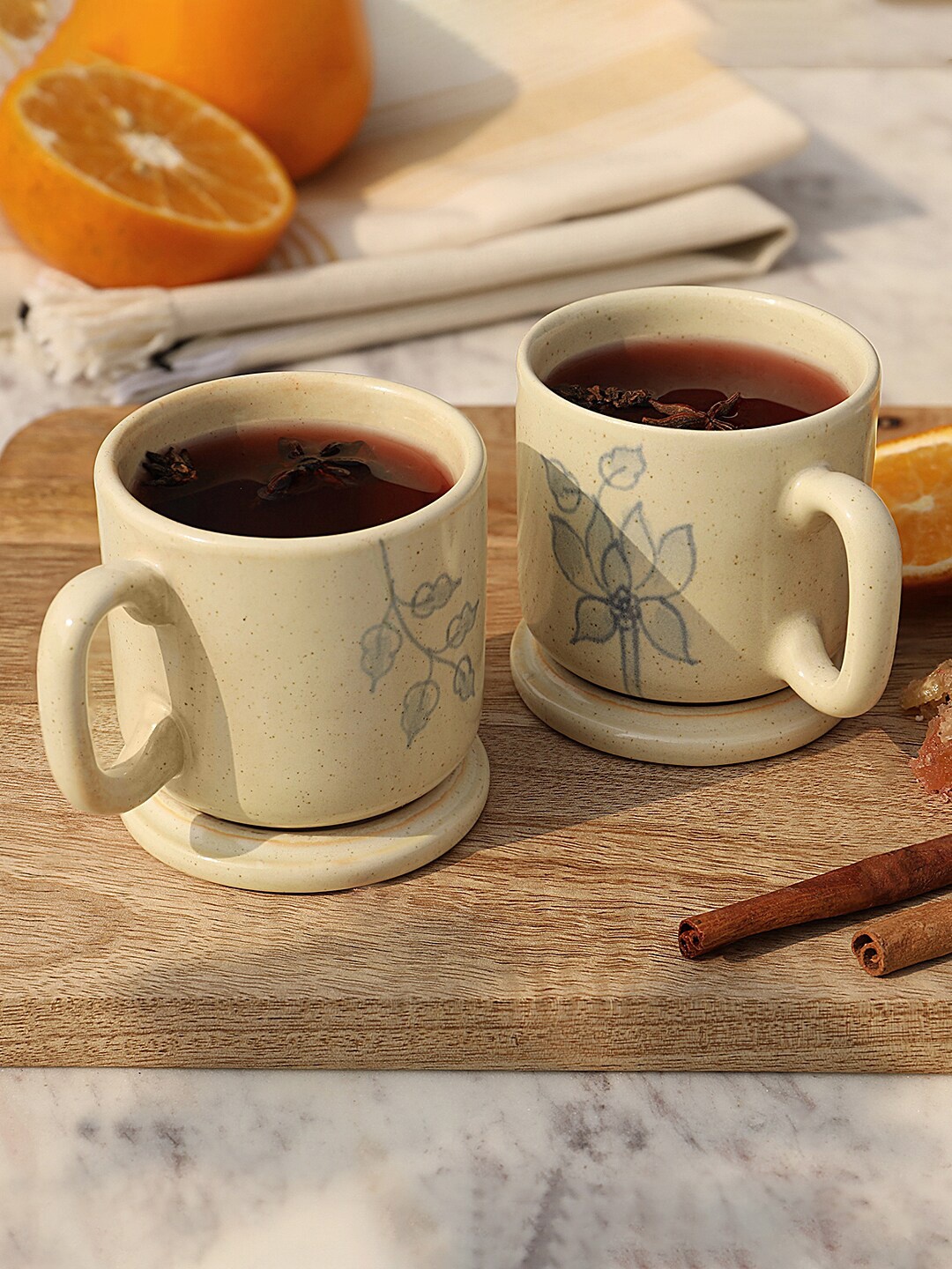 

ellementry Cream-Coloured Set Of 2 Ethnic Motifs Printed Ceramic Mug Set with Lid