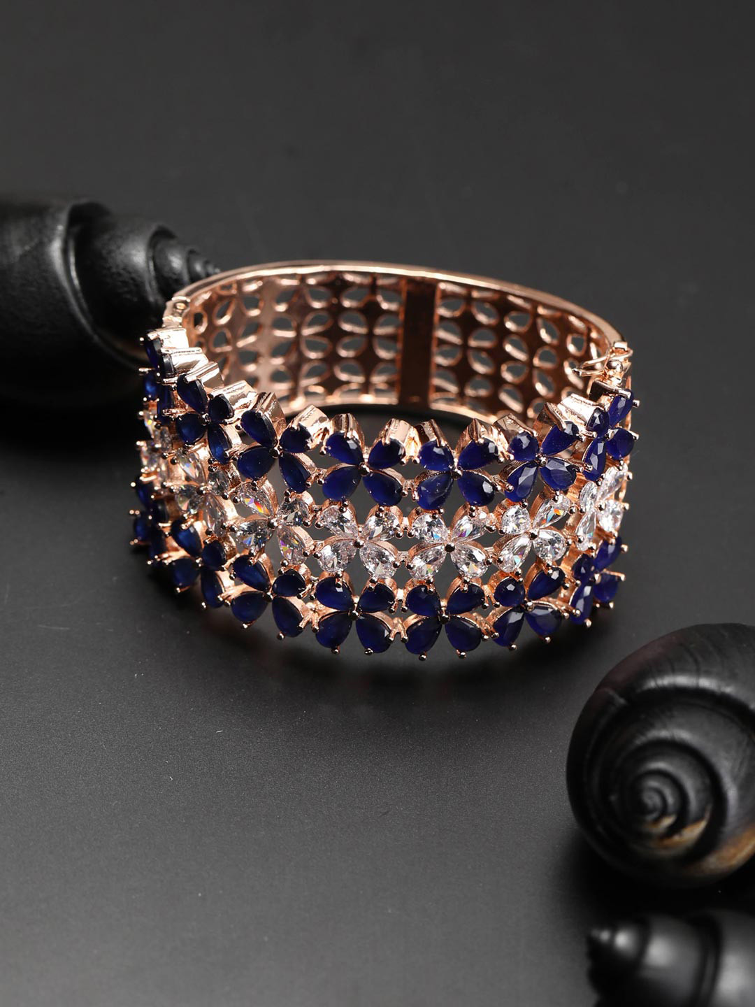 

Priyaasi Women Rose Gold & Blue American Diamond Handcrafted Rose Gold-Plated Cuff Bracelet
