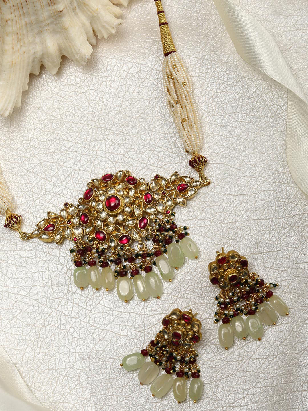 

Priyaasi Gold-Plated & White Stone Studded Ruby Kundan Jewellery Set