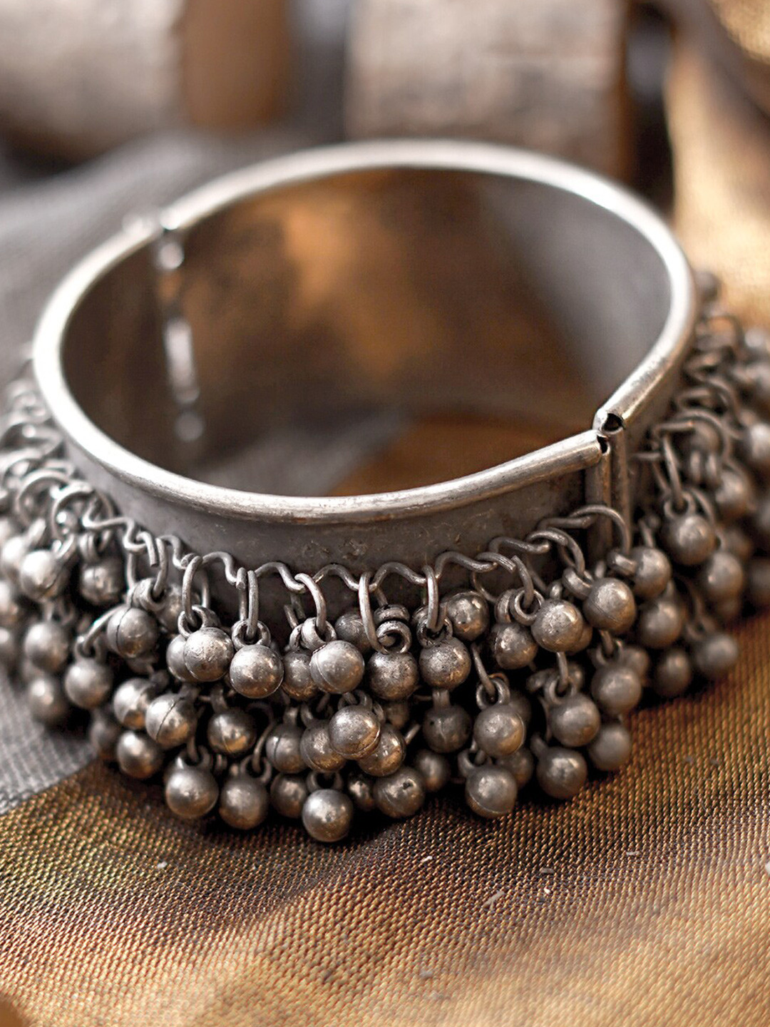 

TEEJH Women Silver German Silver Oxidised Bangle-Style Bracelet