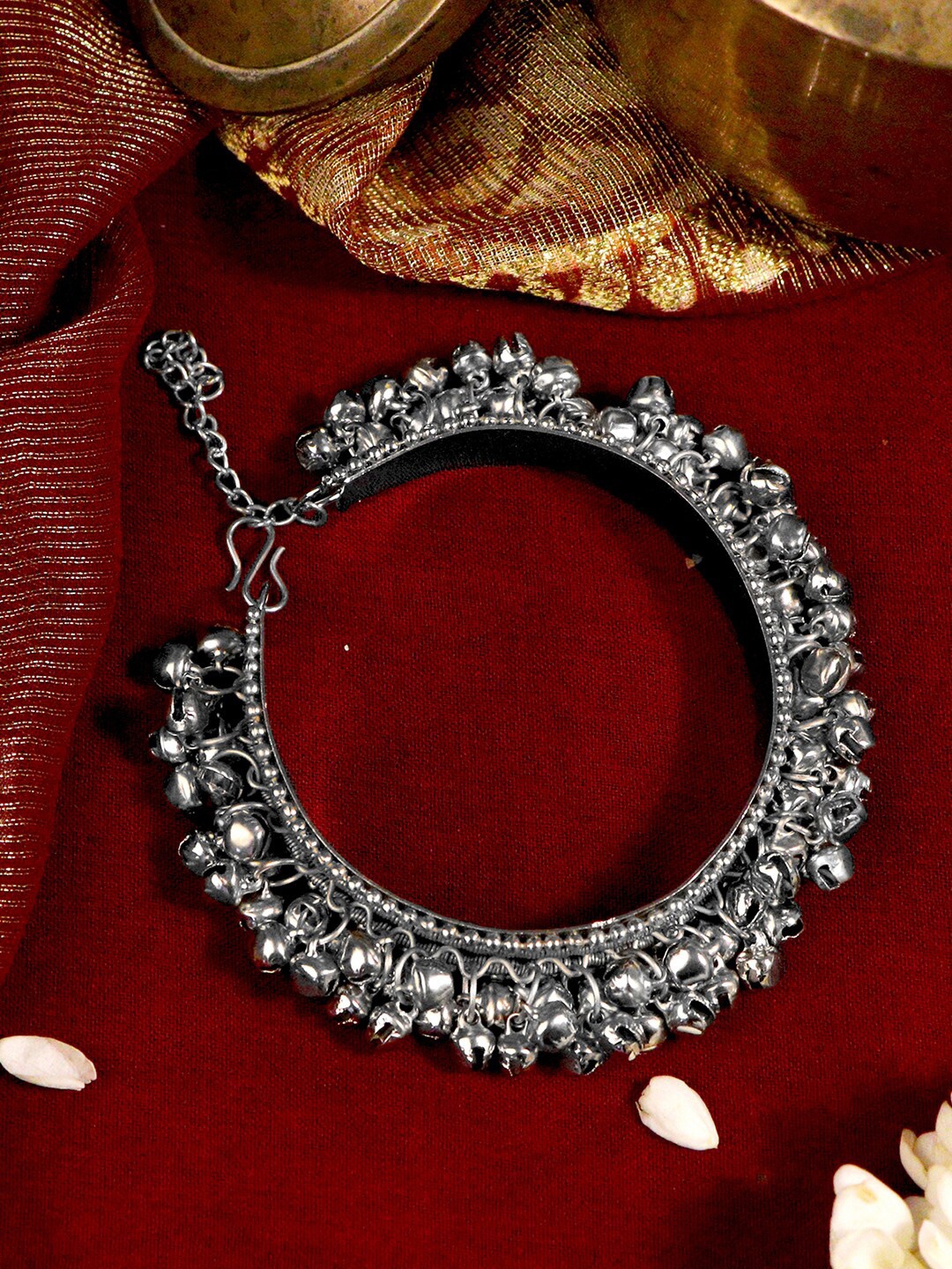 

TEEJH Women Silver German Silver Oxidised Ghungroo Bangle-Style Bracelet