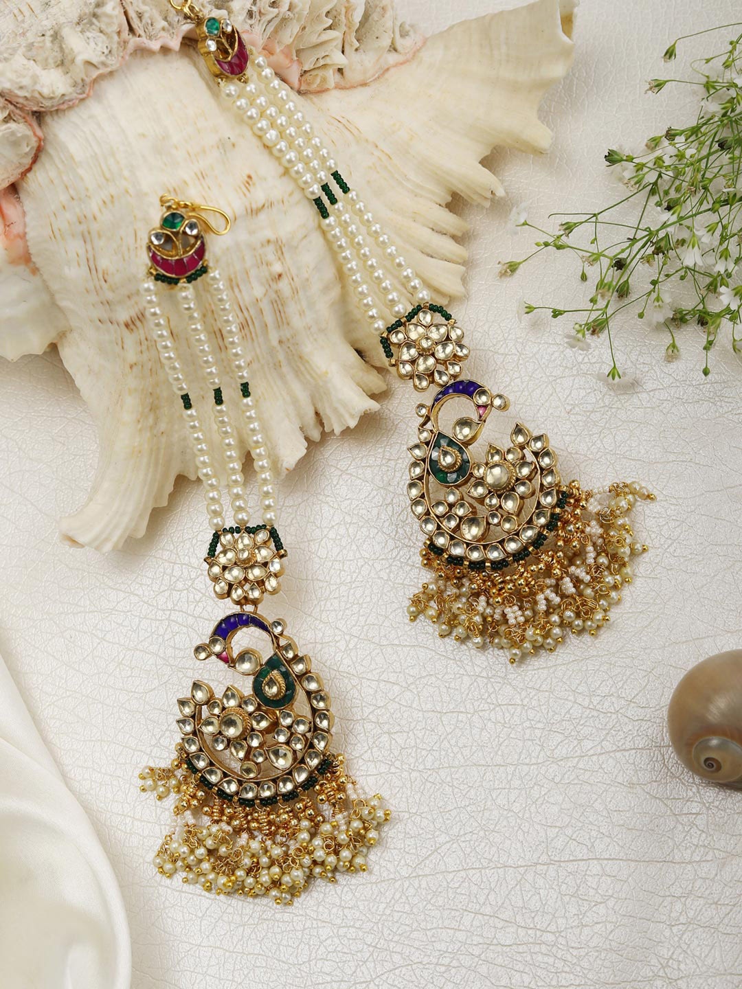 

Priyaasi White & Green Gold-Plated Kundan Peacock Shaped Drop Earrings