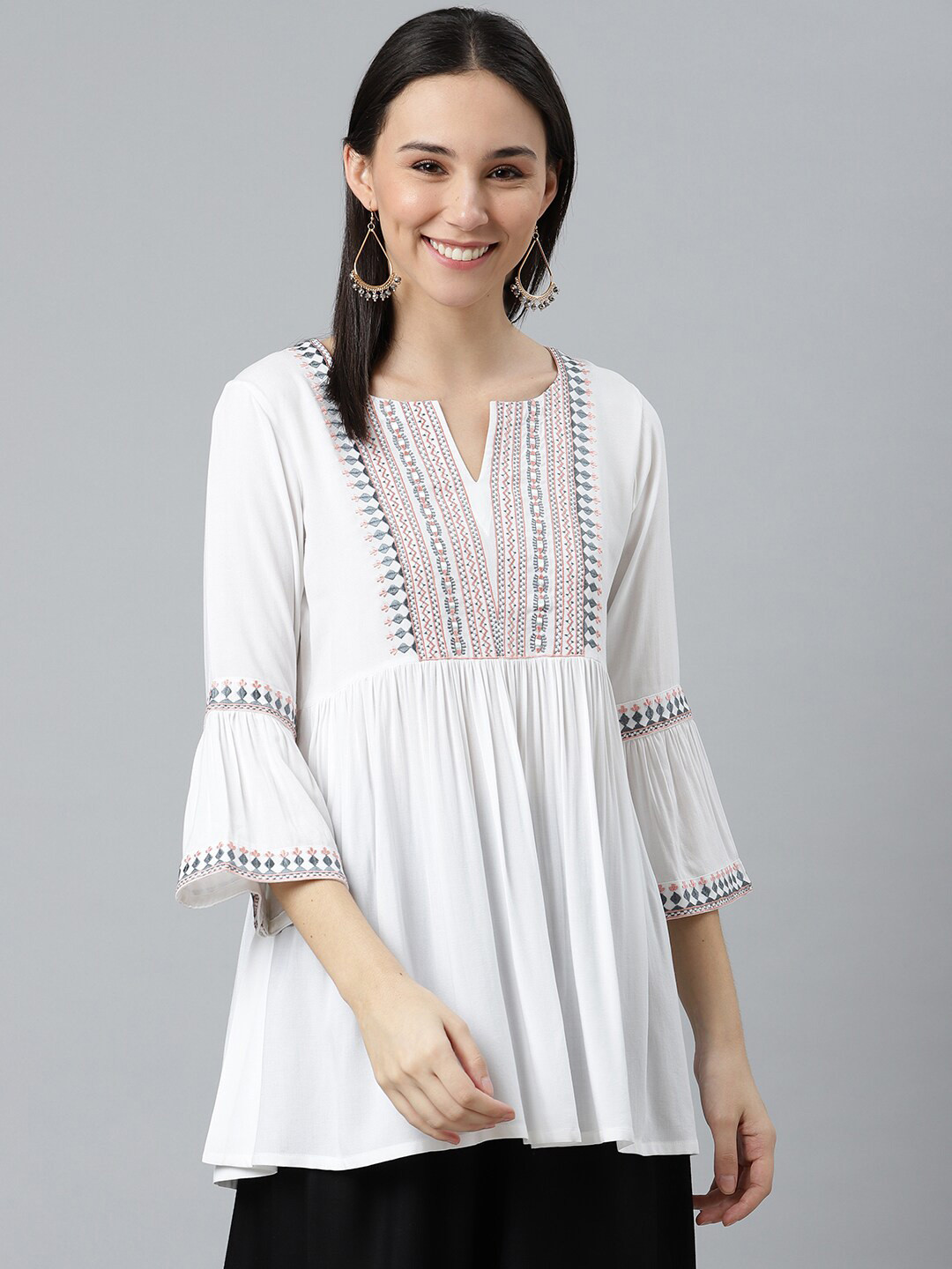 

Libas Woman White & Grey Embroidered Bell Sleeves Thread Work Kurti