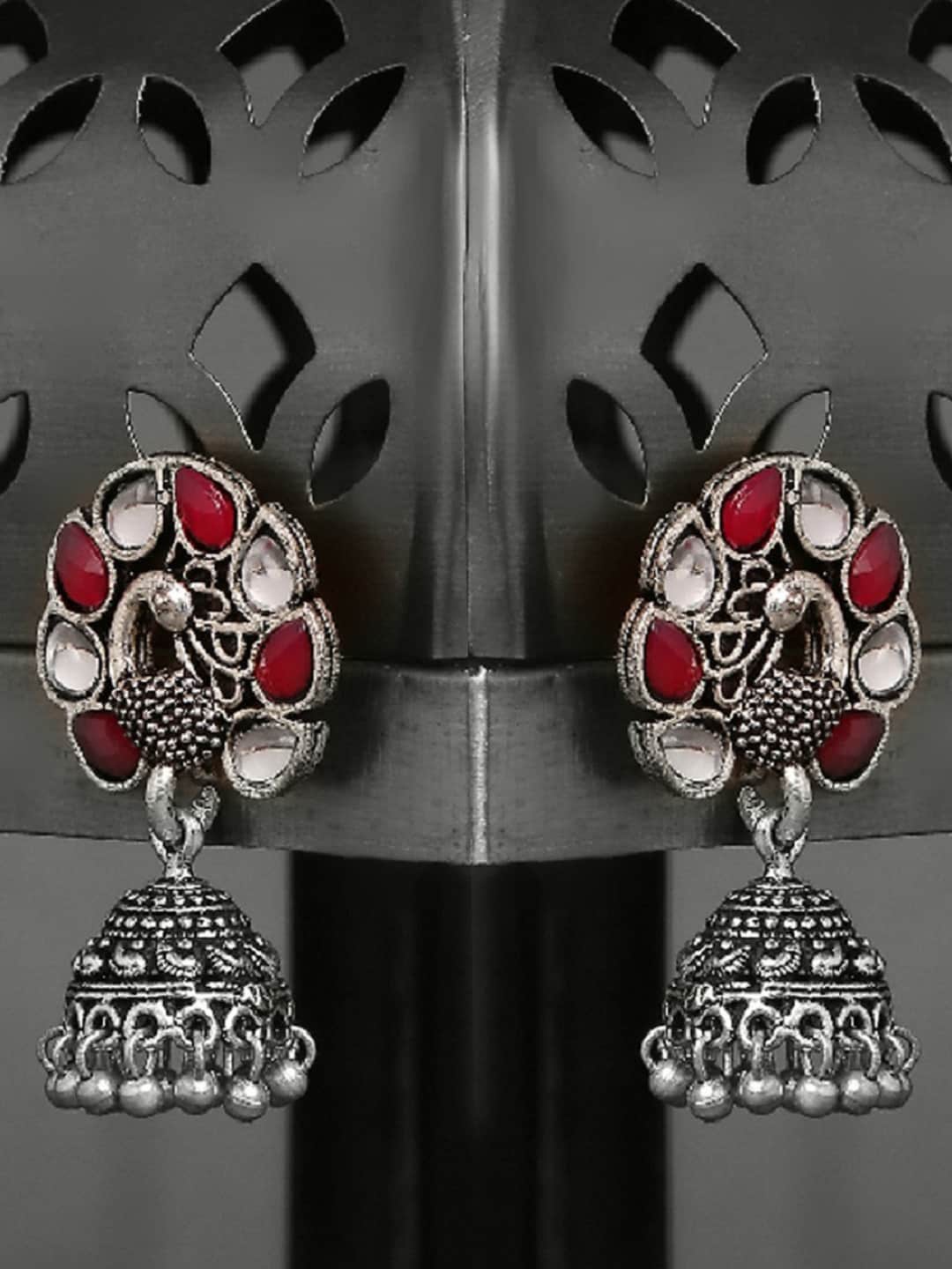 

OOMPH Women Maroon & white Oxidized Silver Plated Peacock Shape Jhumka Earrings