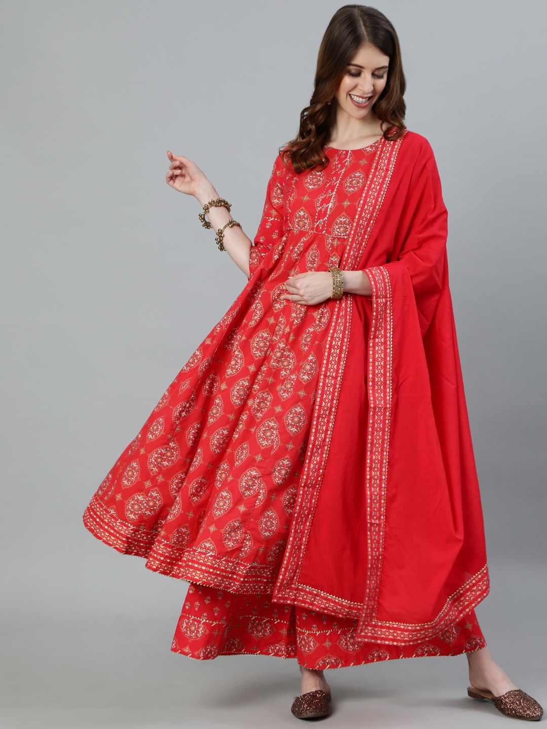 

Ishin Women Red Printed Panelled Pure Cotton Kurta with Palazzos & With Dupatta