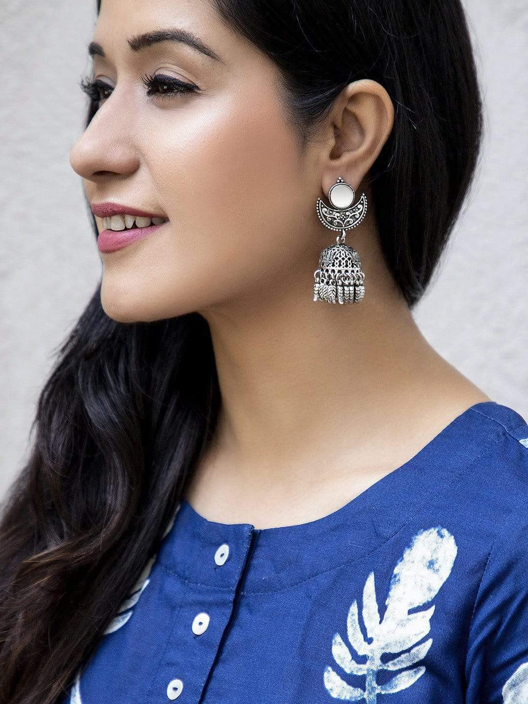 

Rubans Silver Toned Dome Shaped Hand Crafted Jhumkas Earrings