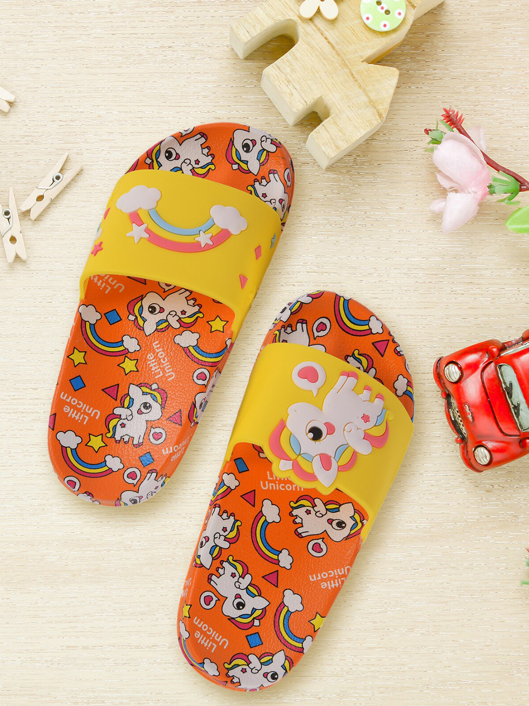 

Yellow Bee Girls Orange & Yellow Printed Rubber Sliders