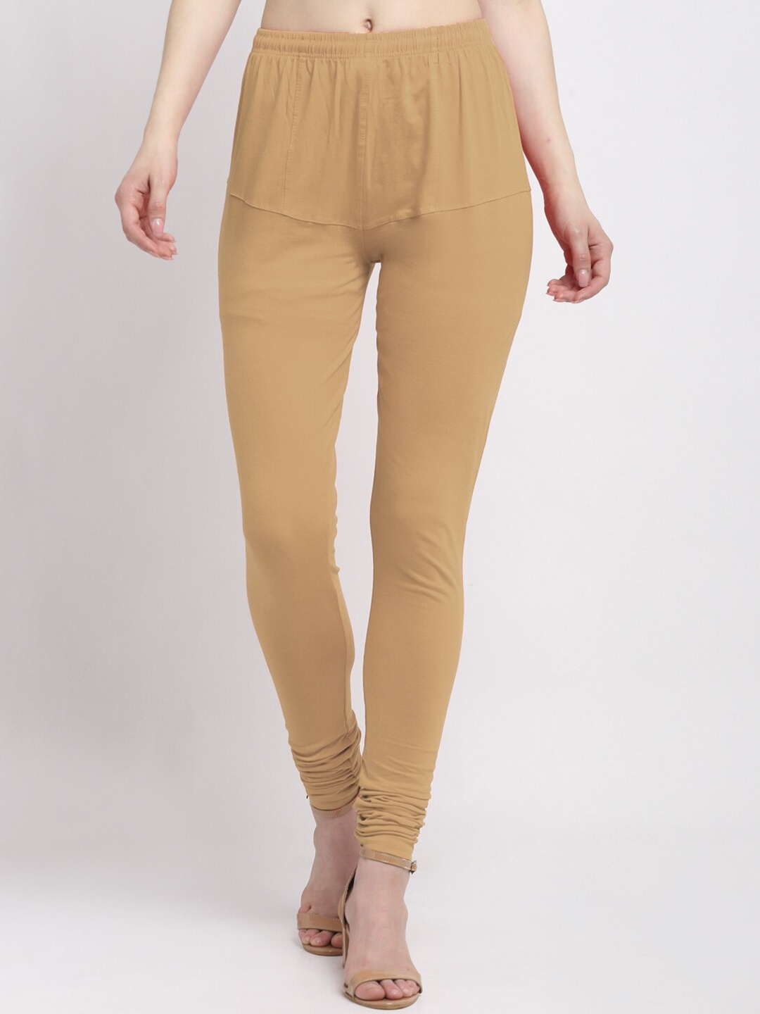 

Klotthe Women Beige Solid Churidar-Length Leggings