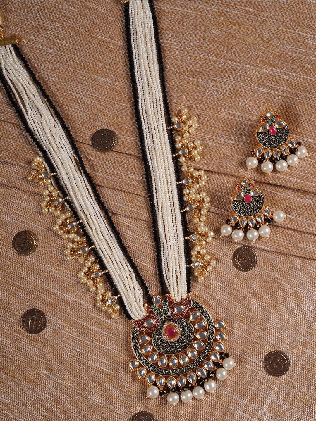 

Shoshaa Gold-Plated White & Black Kundan-Studded & Beaded Handcrafted Jewellery Set