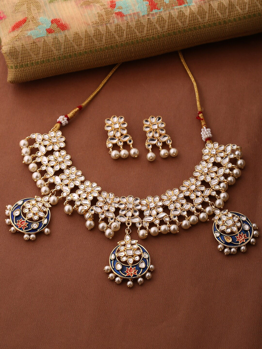 

Shoshaa Gold-Plated White & Navy Blue Kundan-Studded Enameled Handcrafted Jewellery Set