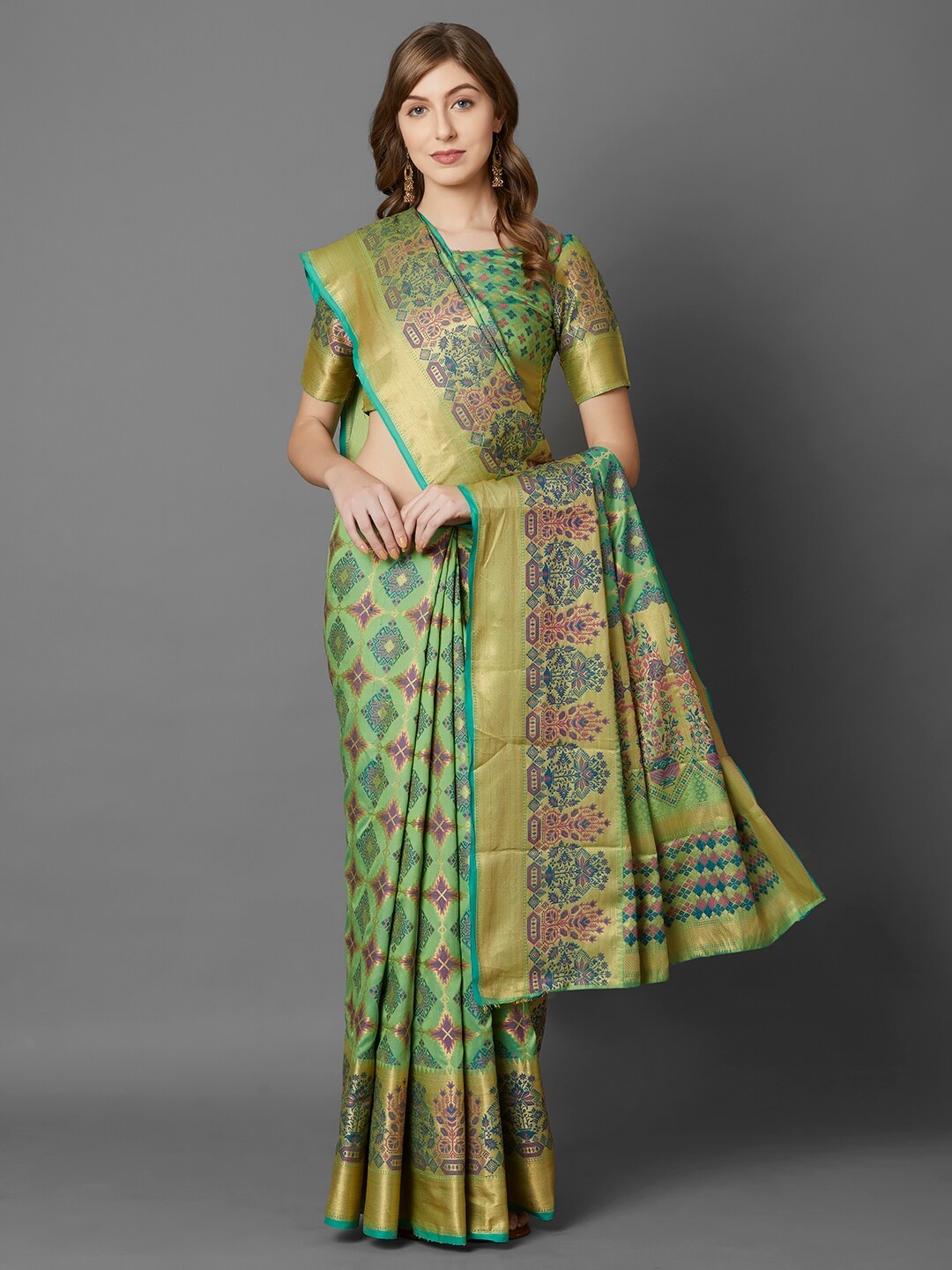 

Mitera Green & Brown Ethnic Motifs Silk Blend Saree