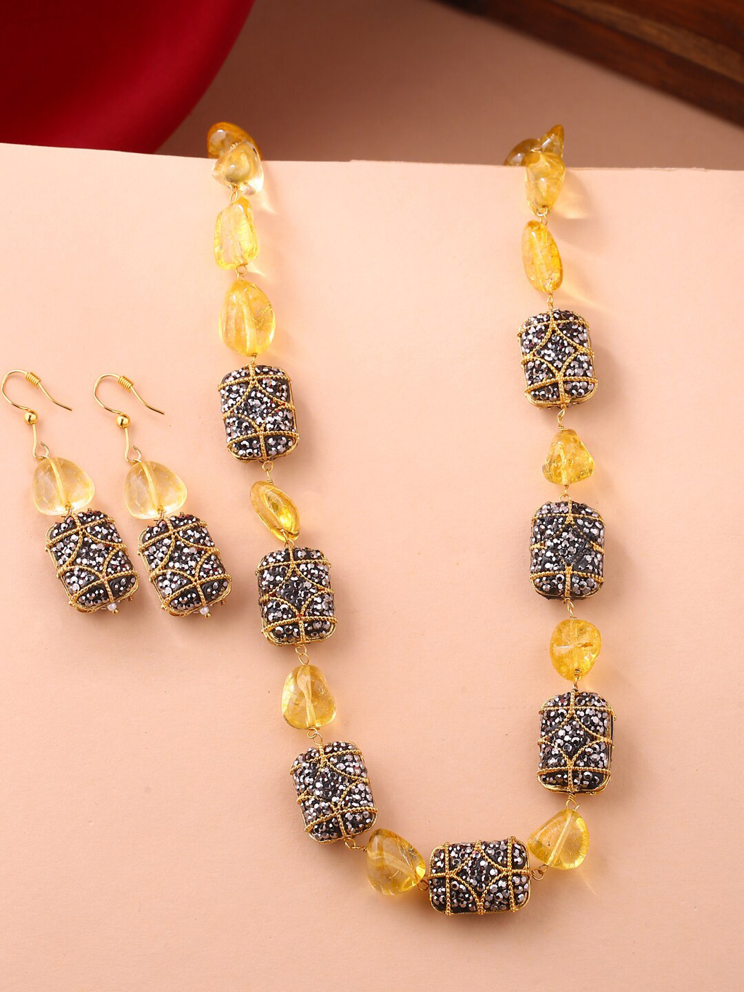 

Shoshaa Gold-Plated Yellow & Black Stone-Studded & Beaded Handcrafted Jewellery Set