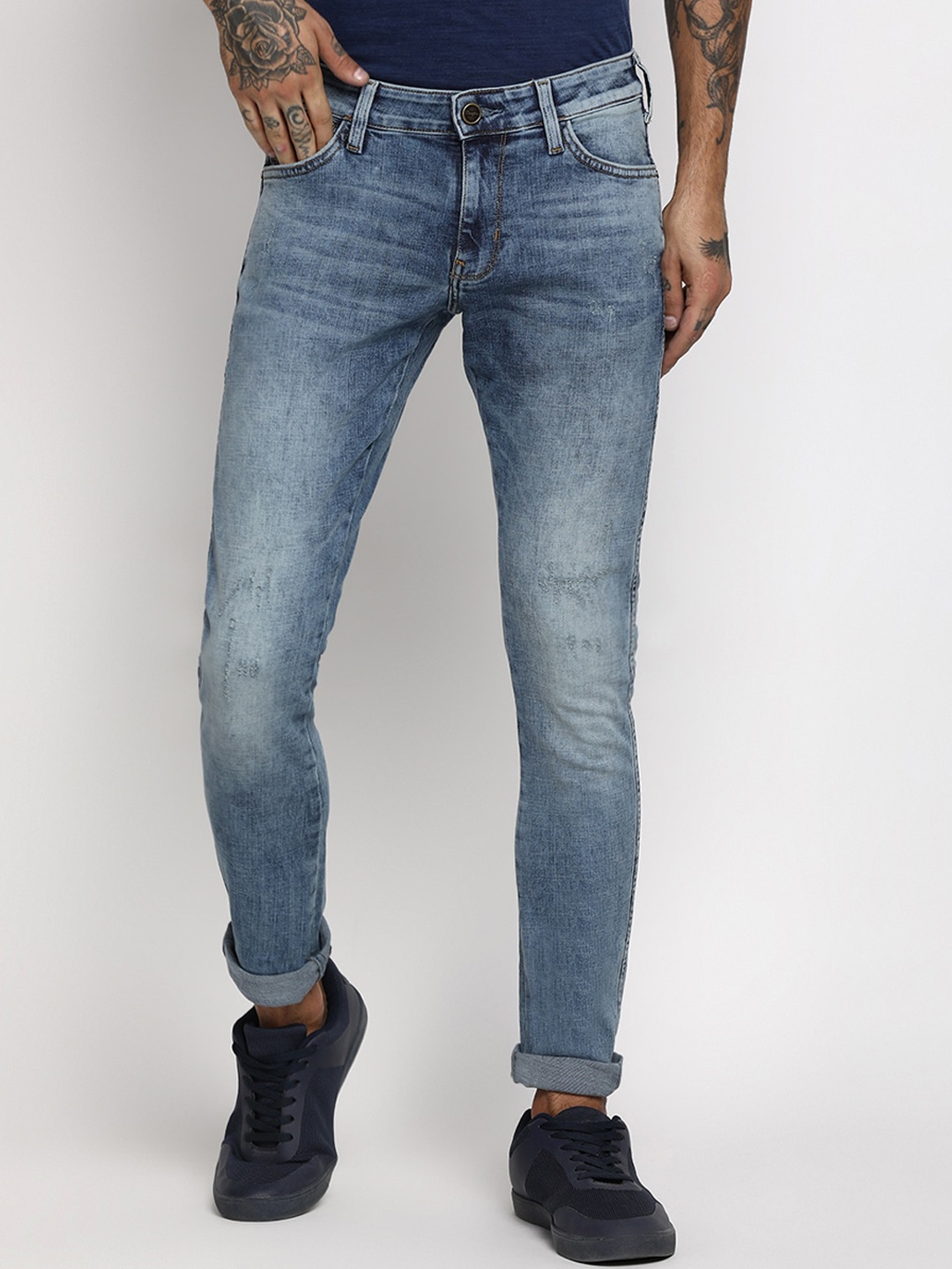 

Wrangler Men Blue Skinny Fit Low-Rise Low Distress Heavy Fade Jeans
