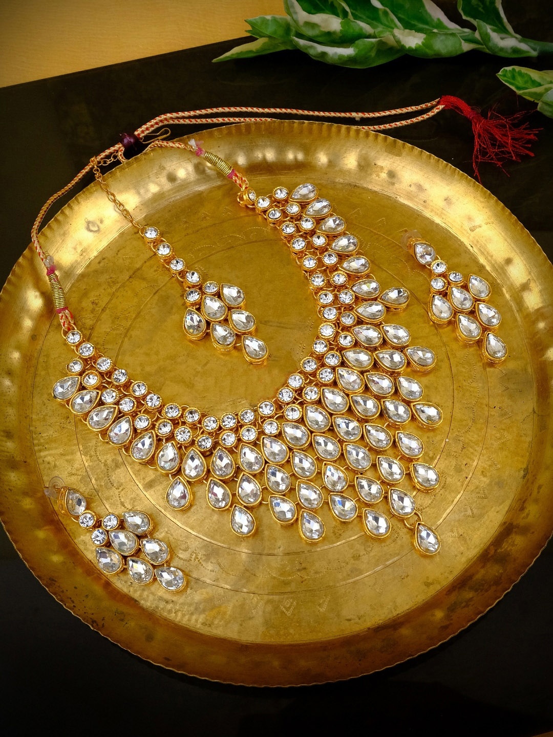 

Crunchy Fashion Gold-Plated White Kundan-Studded Jewellery Set