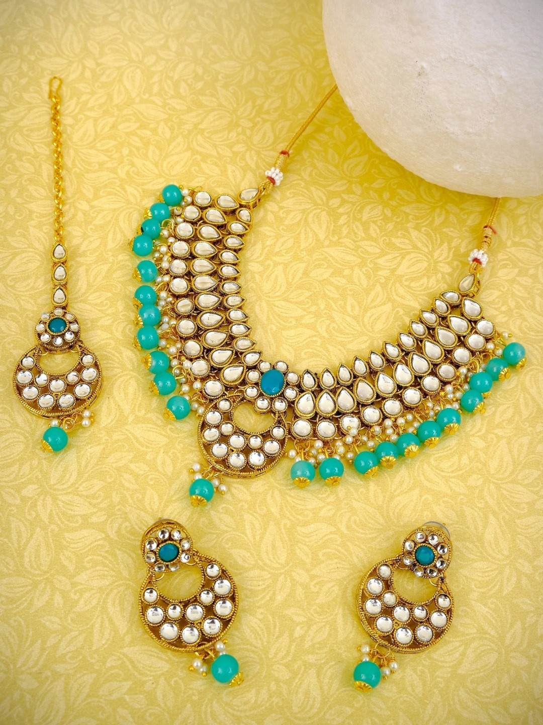 

Crunchy Fashion Gold-Plated & Turquoise Blue Kundan-Studded & Pearl-Beaded Jewellery Set