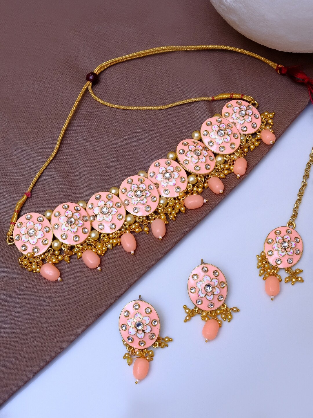 

Crunchy Fashion Gold-Plated White & Peach-Coloured Kundan-Studded & Beaded Antique Jewellery Set