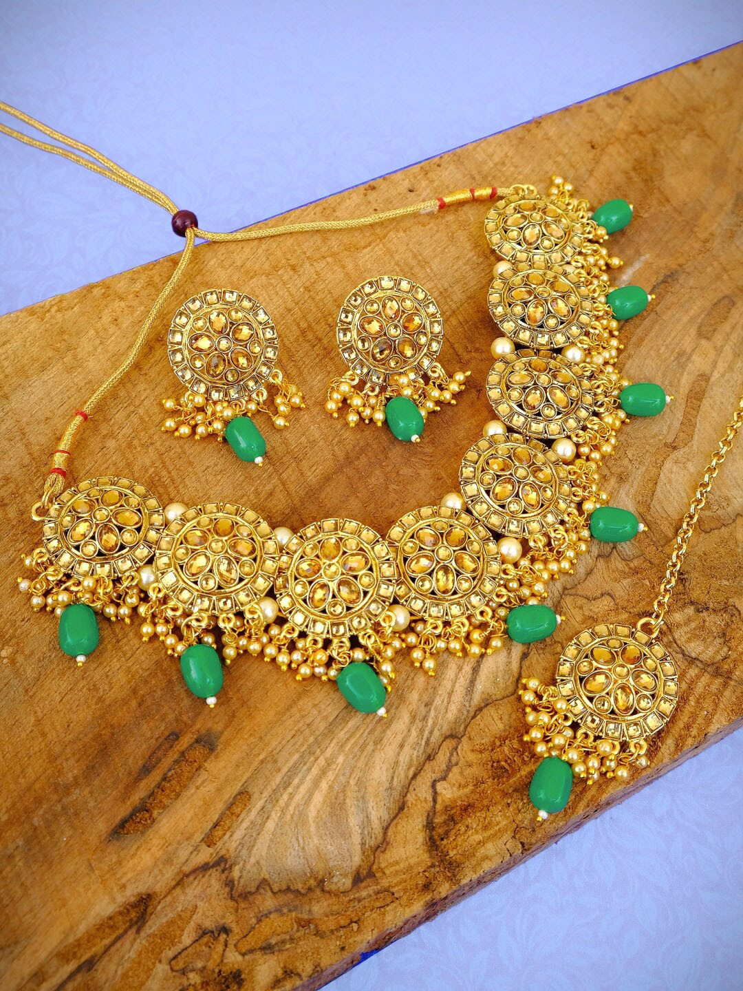 

Crunchy Fashion Gold-Plated Beige & Green Stone-Studded Pearl Choker Jewellery Set