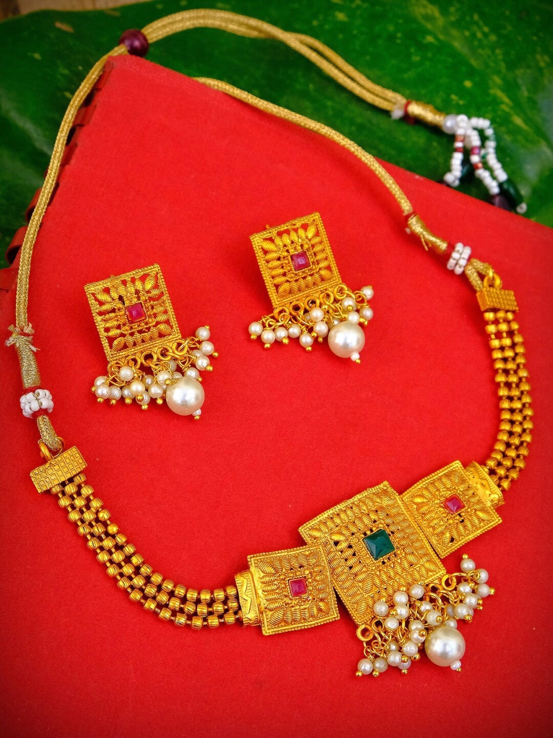 

Crunchy Fashion Gold-Plated White & Green Stone-Studded Pearl Choker Jewellery Set