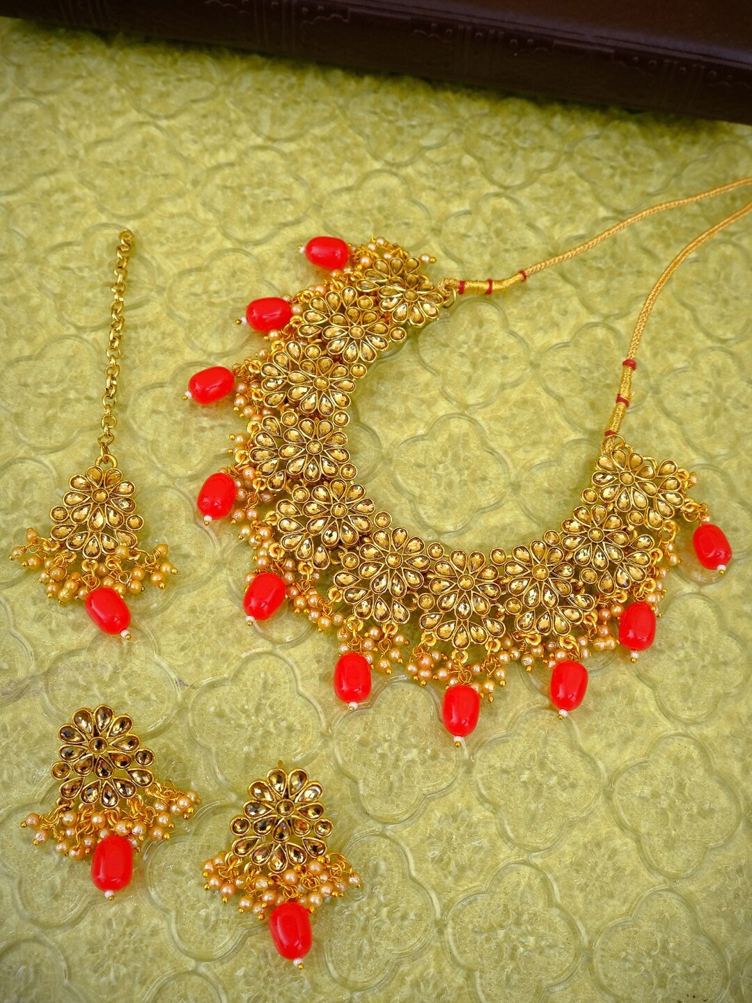 

Crunchy Fashion Gold-Plated Red Pearl-Studded Floral Jewellery Set