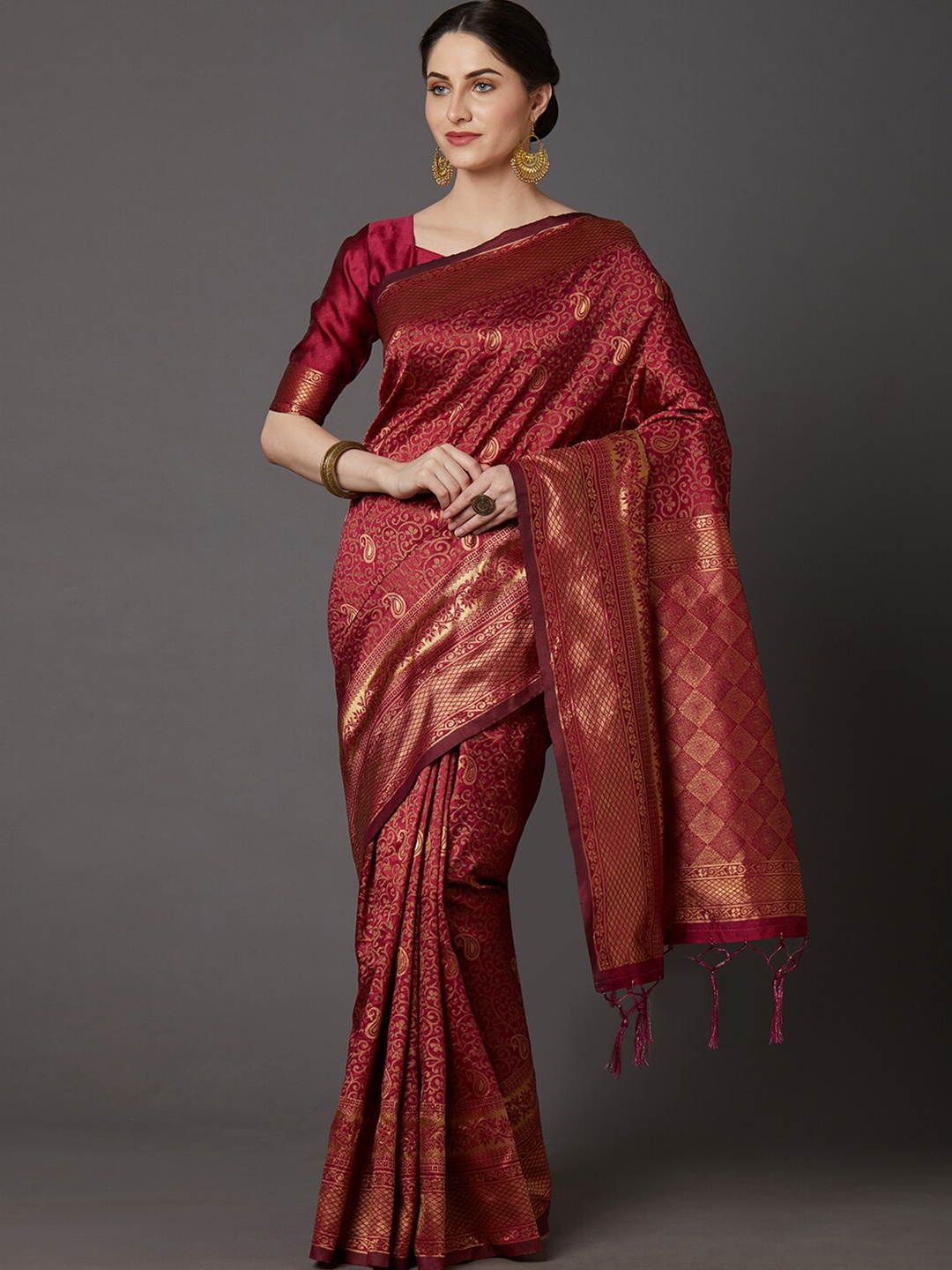 

Mitera Maroon & Gold-Toned Ethnic Motifs Zari Silk Blend Banarasi Saree
