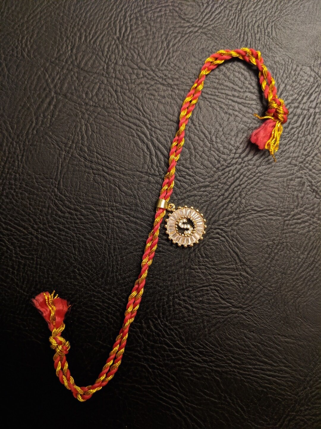 

Digital Dress Room Men Gold Letter S Mauli Thread Rakhi