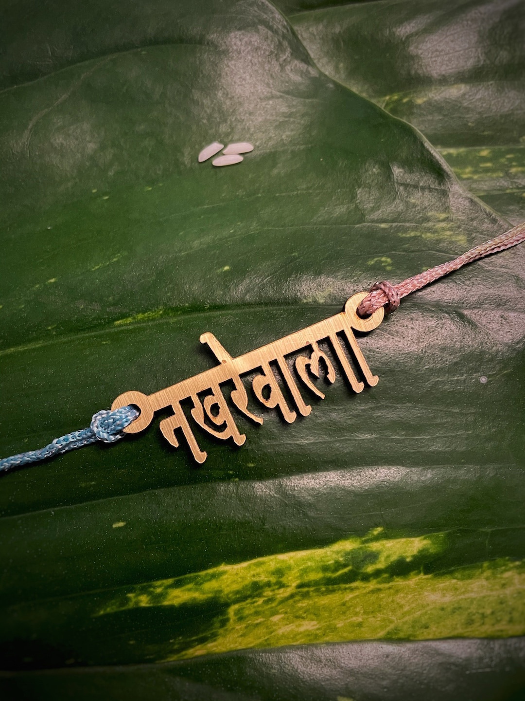 

Digital Dress Room Fancy Rakhi Design with NAKREWALA Pendant, Gold