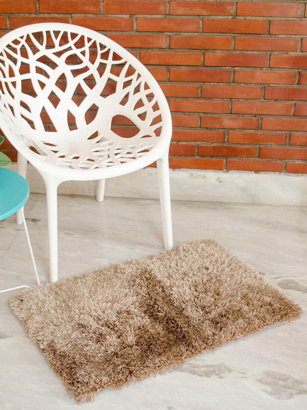 

AVI Living Beige Solid Rectangular Shaggy Carpet