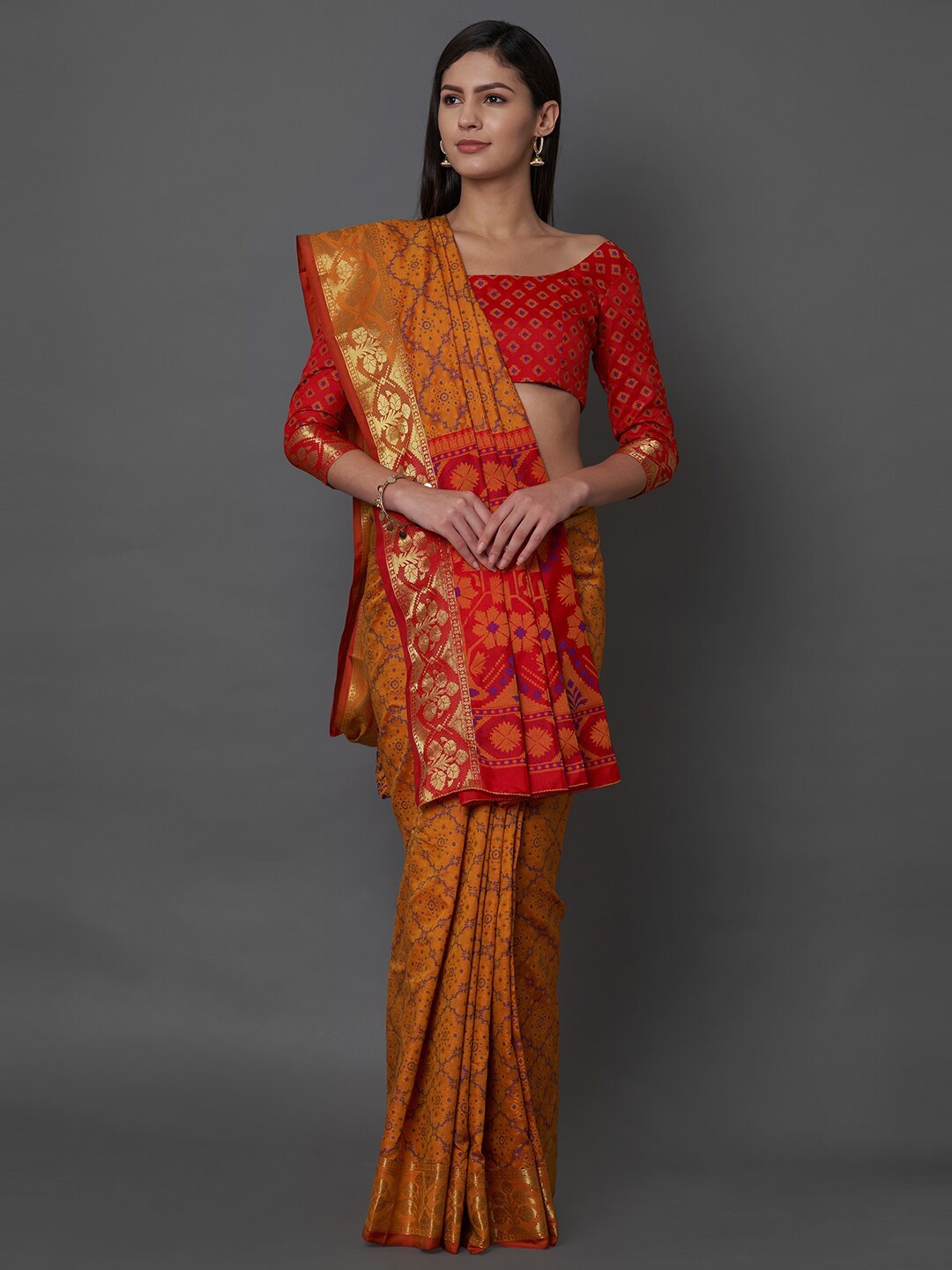 

Mitera Mustard & Red Ethnic Motifs Zari Silk Blend Banarasi Saree