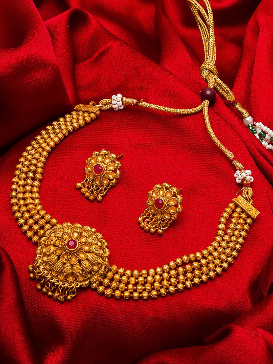 

aadita Gold-Plated Pink Stone-Studded Choker Jewellery Set