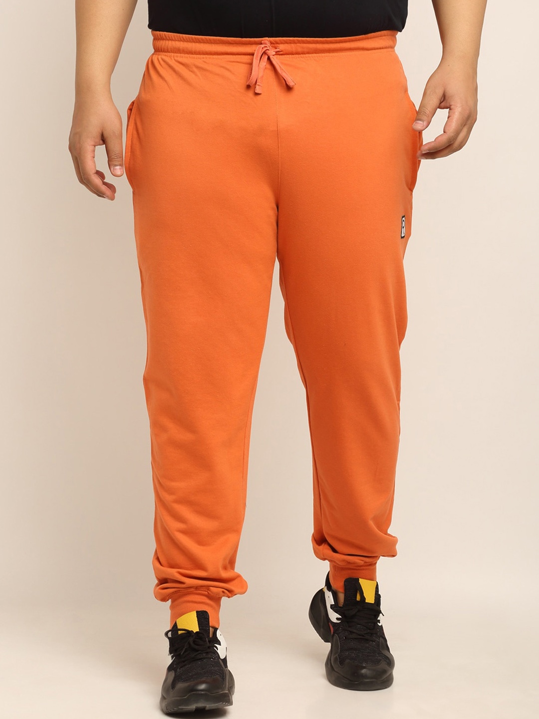 

Rodzen Men Orange Brand Logo Printed Joggers