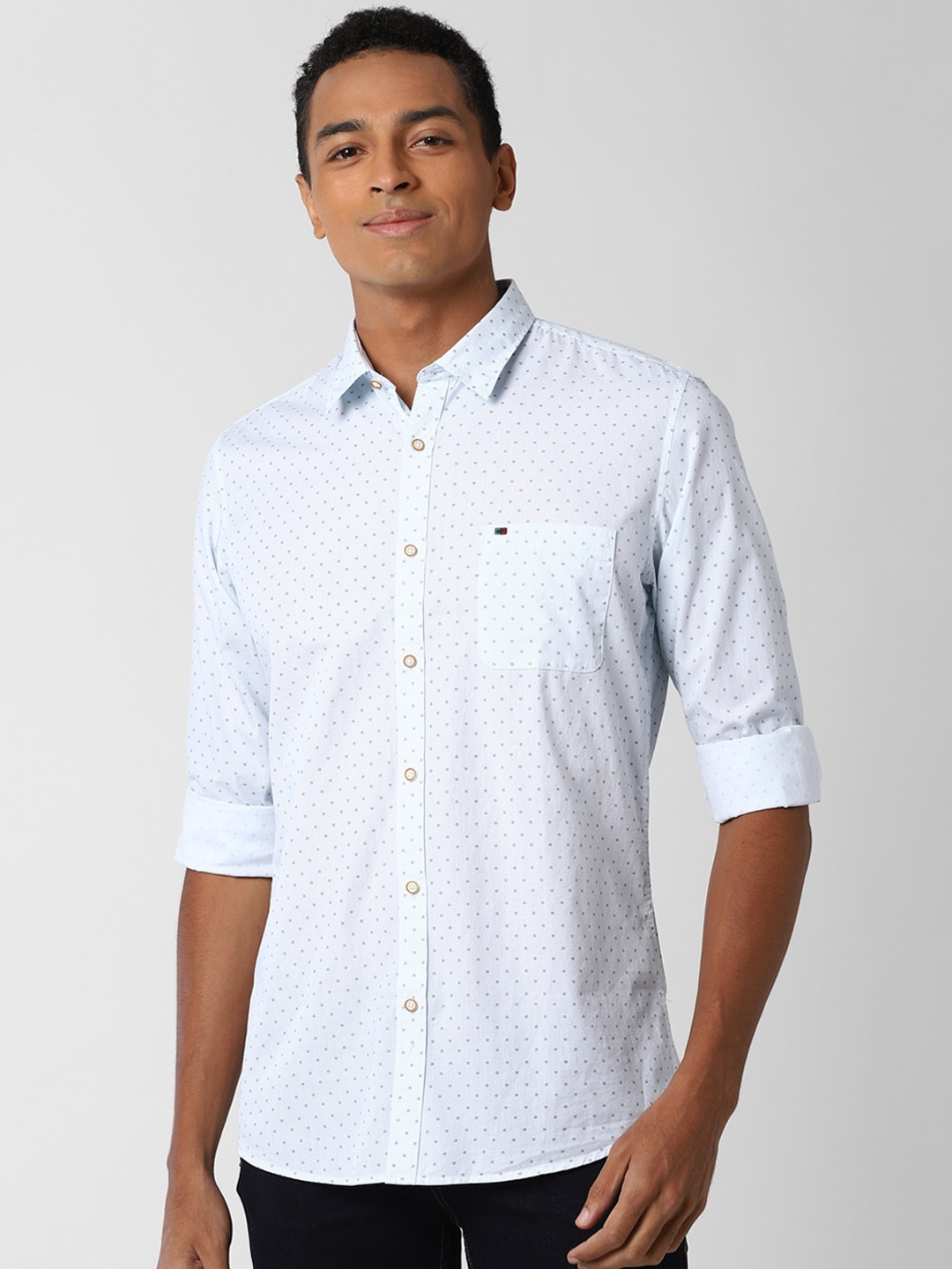 

Peter England Casuals Men Blue Slim Fit Polka Dots Printed Cotton Casual Shirt