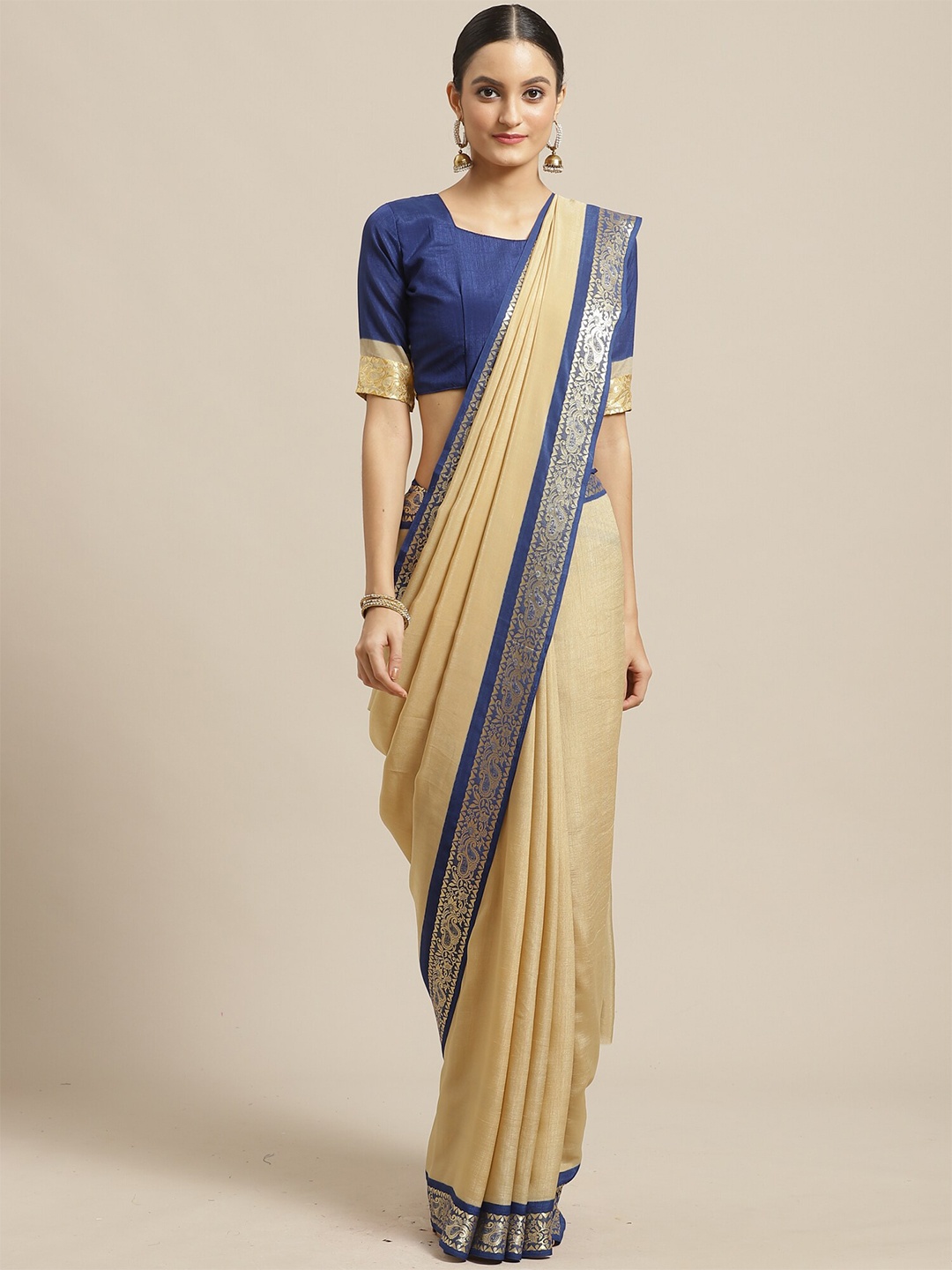 

Saree mall Beige & Blue Solid Saree