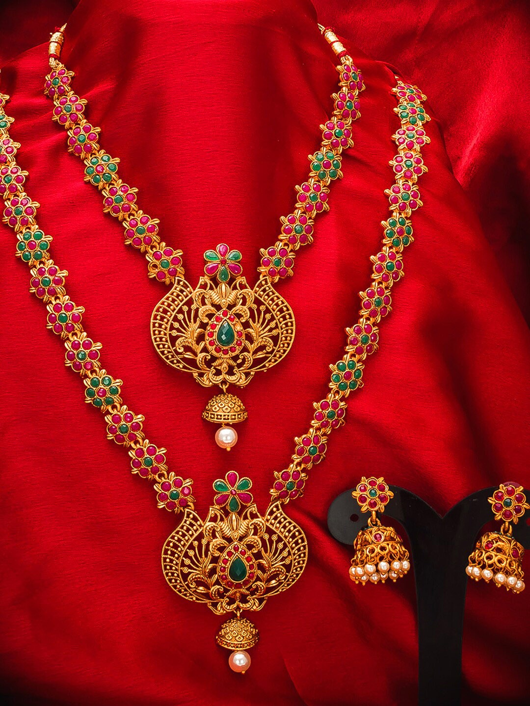 

aadita Gold-Plated Pink & Green Stone-Studded & White Beaded Temple Jewellery Set