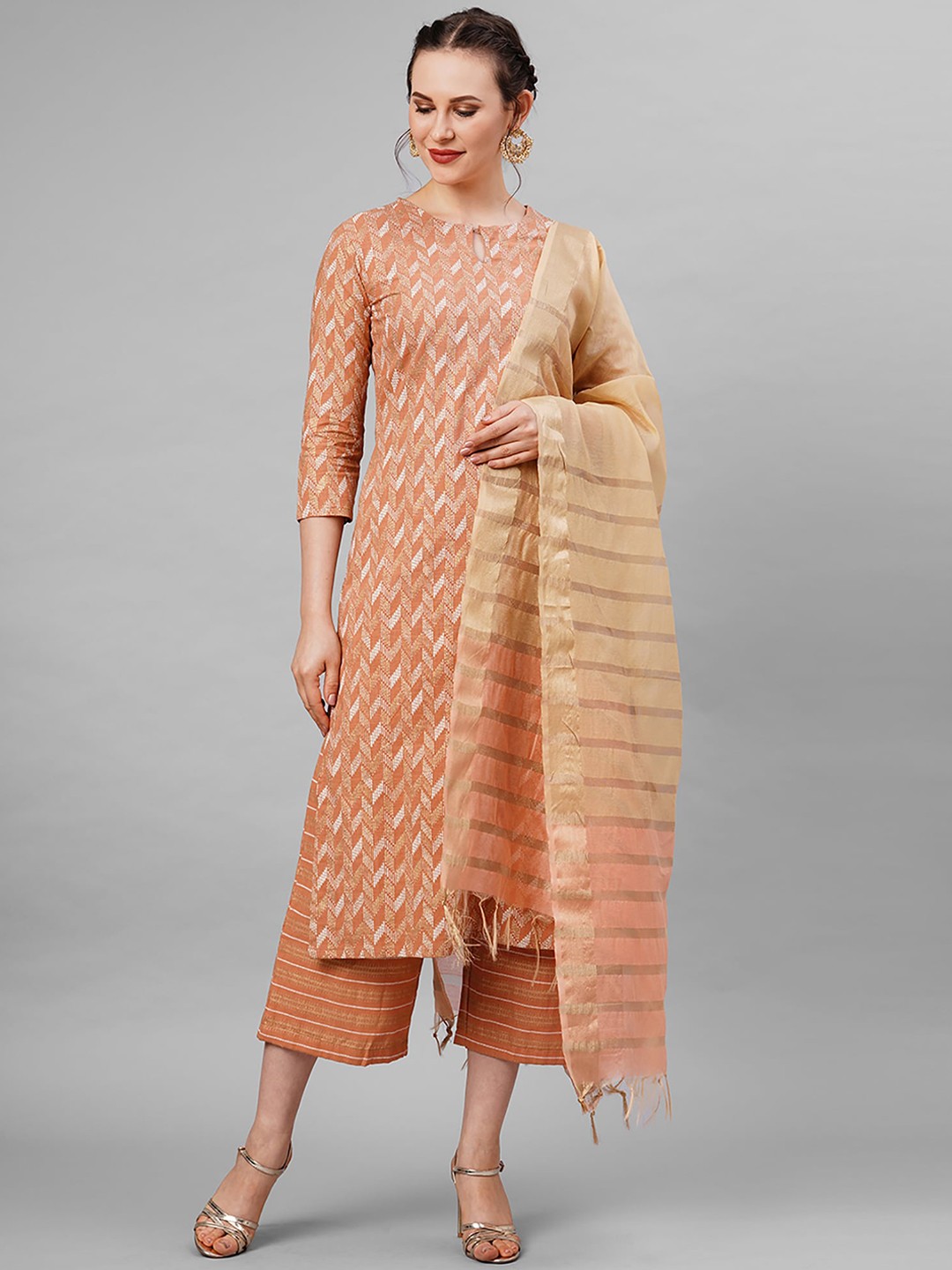 

Indo Era Women Rust Printed Kurta with Palazzos & With Dupatta