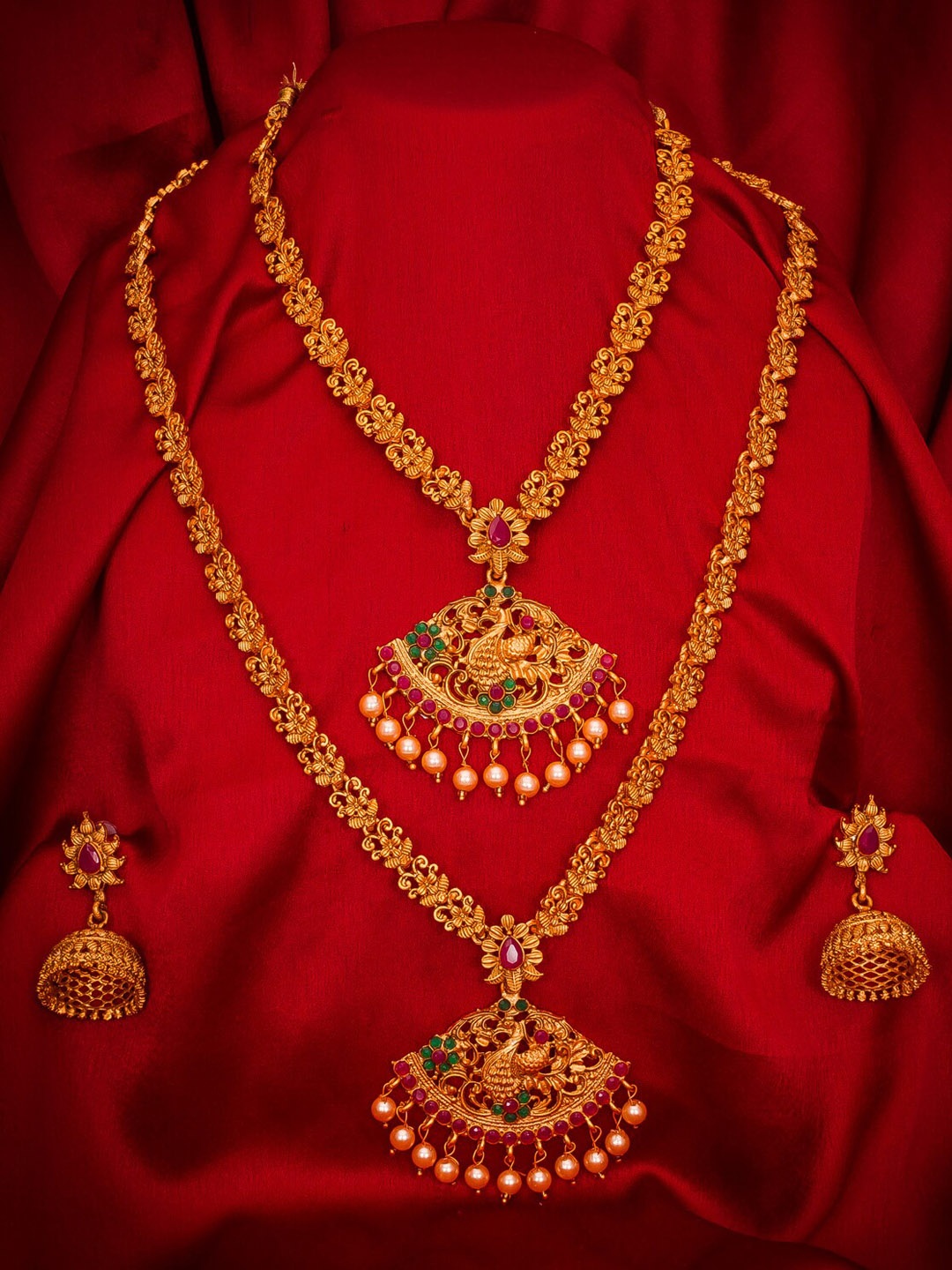 

aadita Gold-Plated Green & Pink Stone-Studded & White Beaded Temple Jewellery Set