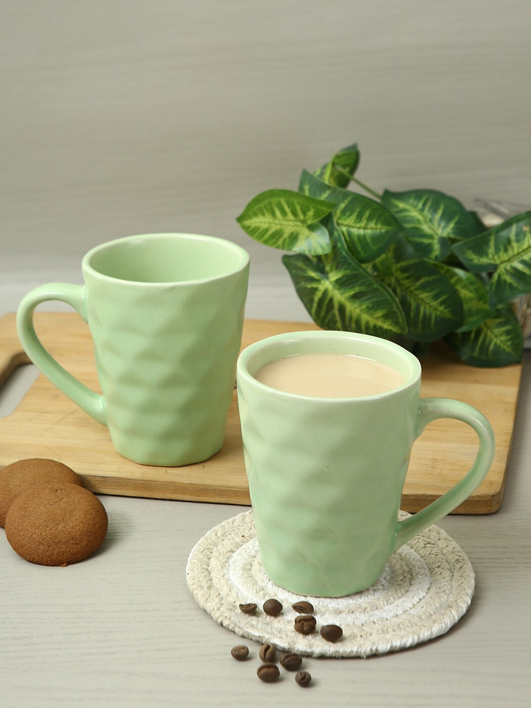 

Aapno Rajasthan Set Of 2 Green Textured Ceramic Glossy Mugs