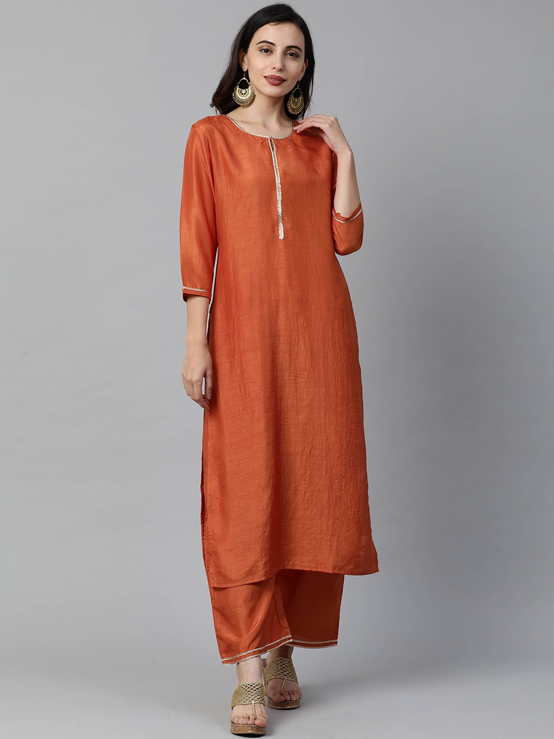 

Indo Era Women Orange Pleated Kurta with Trousers