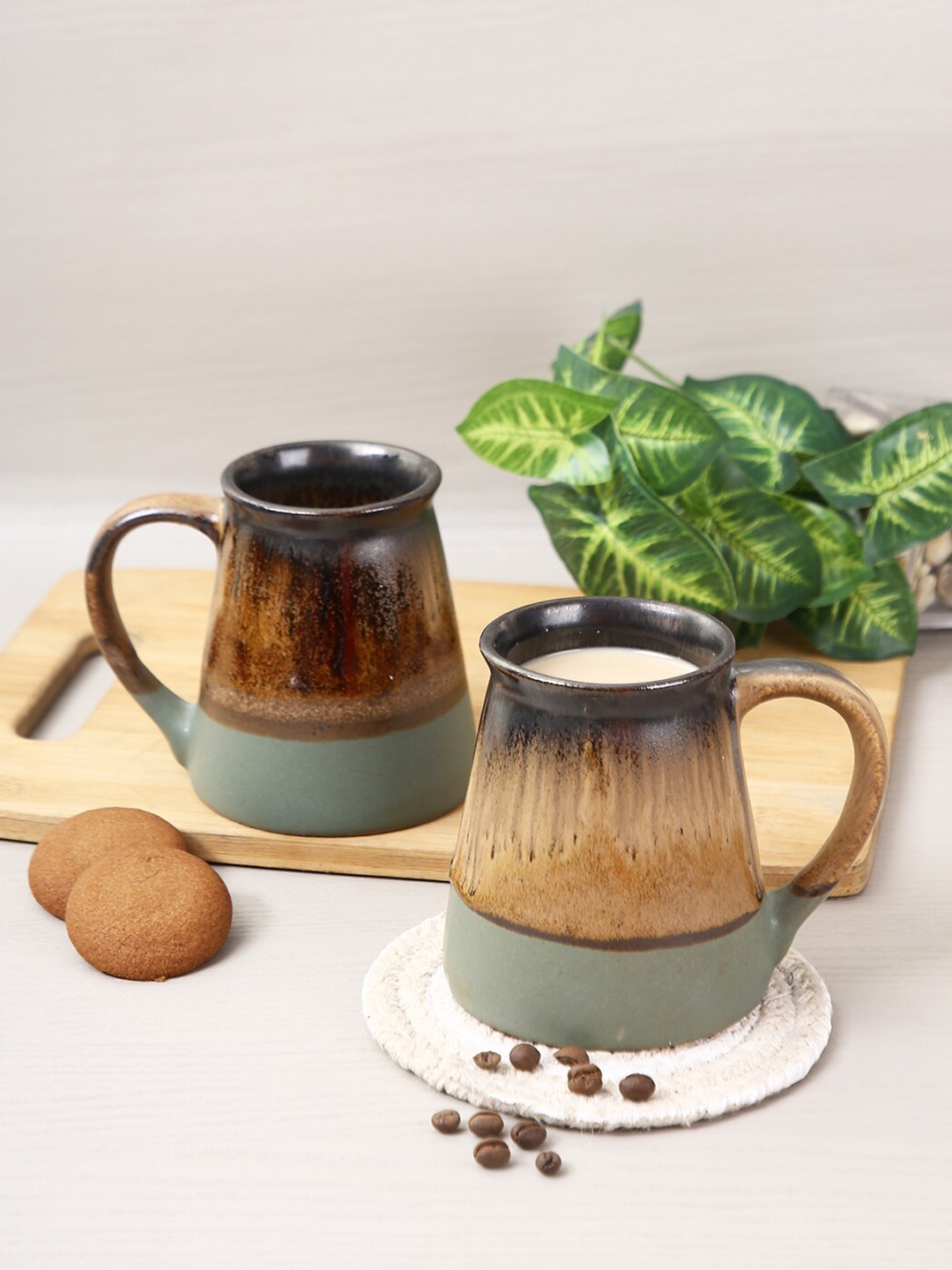 

Aapno Rajasthan Set Of 4 Brown & Grey Textured Ceramic Glossy Mugs
