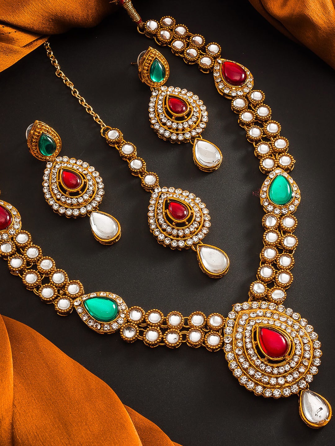 

aadita Gold-Plated Red & White Stone-Studded Temple Jewellery Set