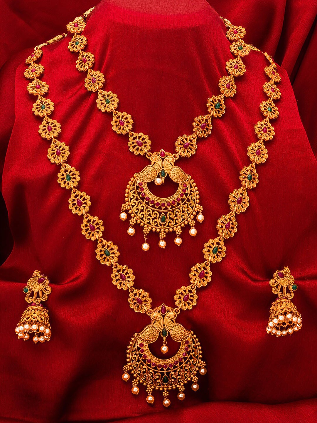 

aadita Gold-Plated Pink & Green Stone-Studded & White Beaded Temple Jewellery Set