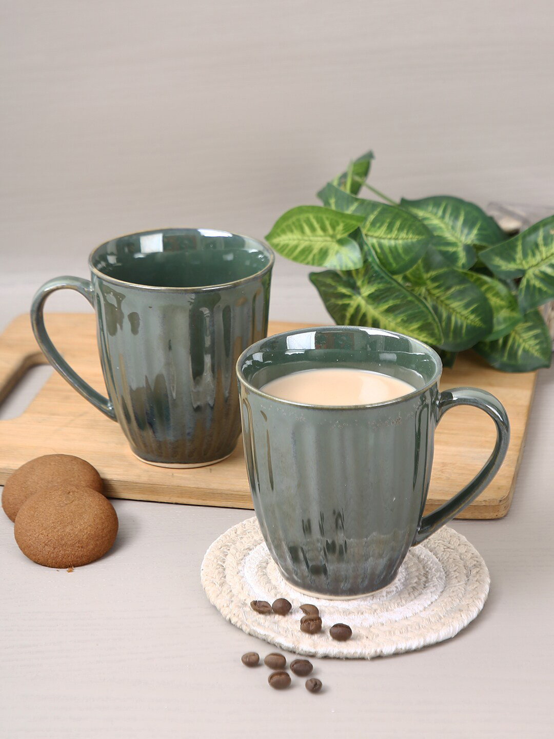 

Aapno Rajasthan Set Of 2 Green Textured Ceramic Glossy Mugs