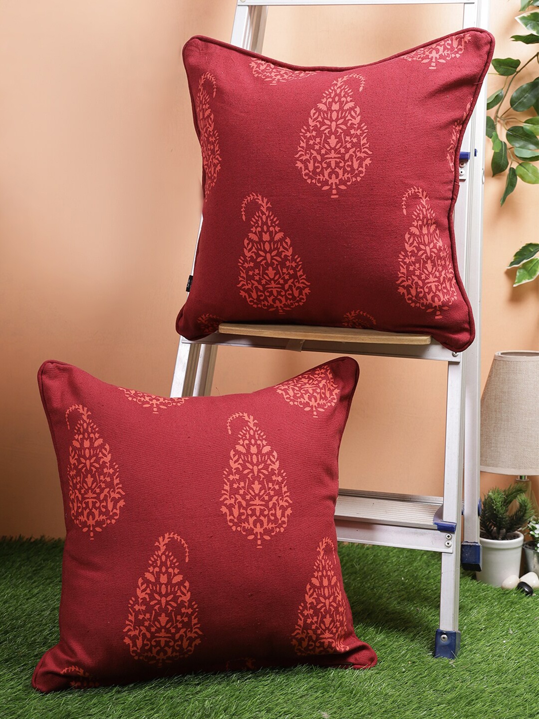 

Soumya Maroon & Peach-Coloured Set of 2 Ethnic Motifs Square Cushion Covers